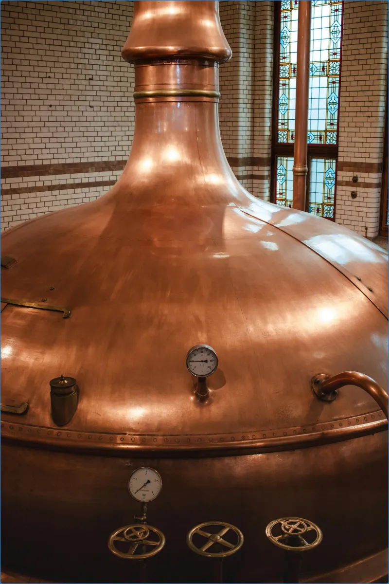 Copper brewing vat with gauges and valves