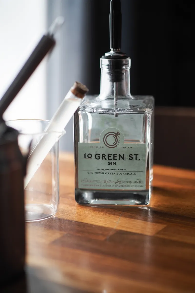 Bottle of gin on a wooden table
